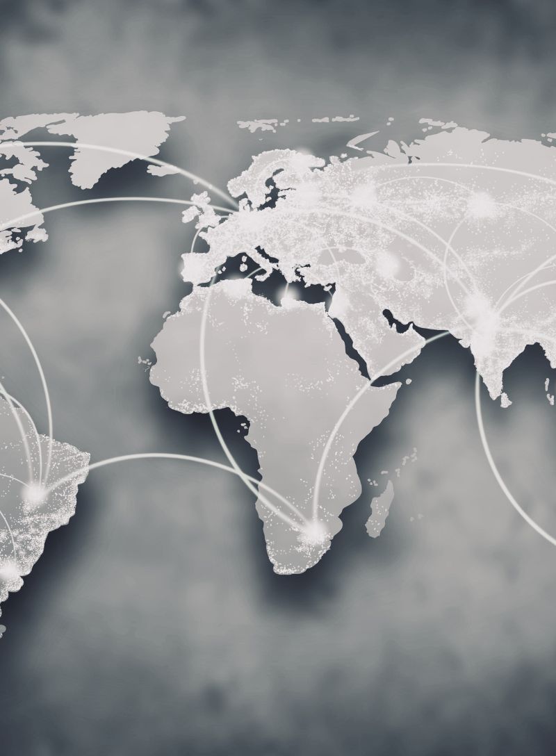 Ripped news articles showing tariffs, oil, concert