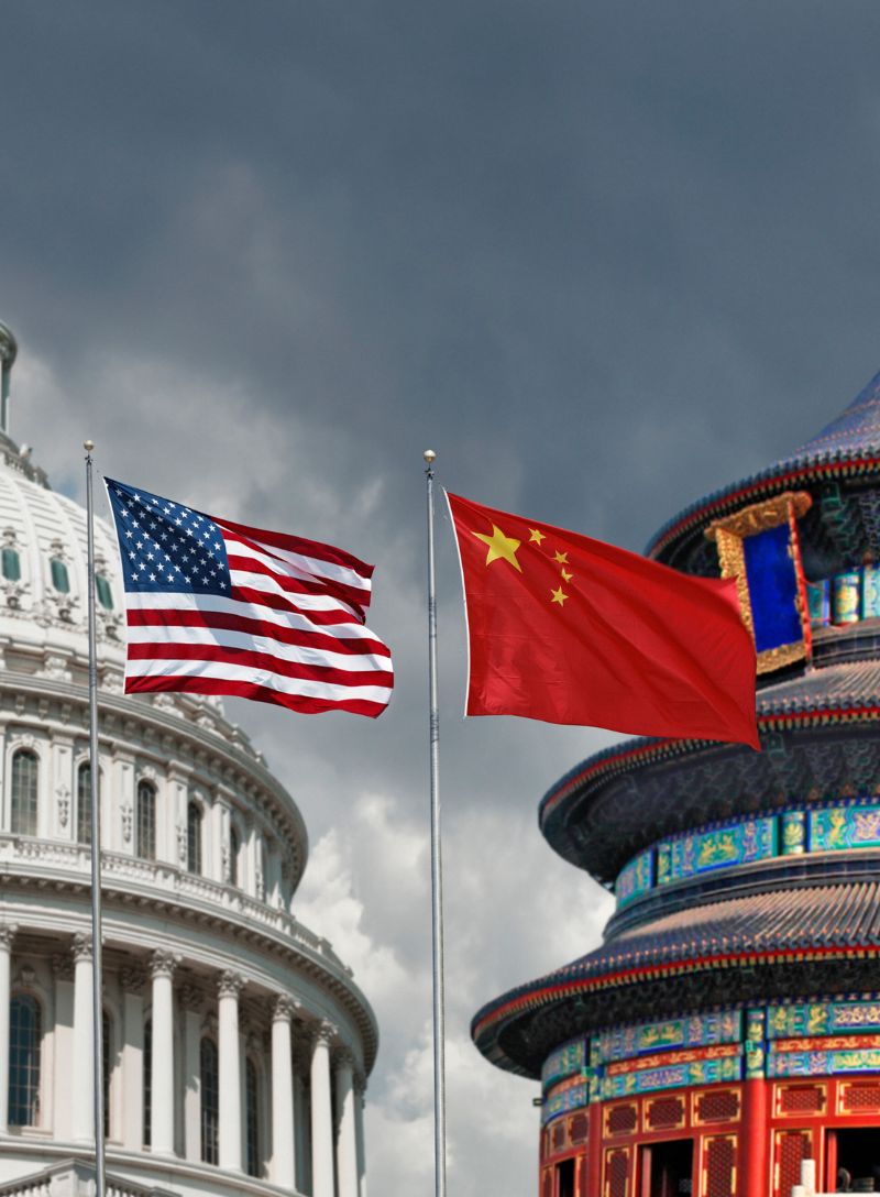 Ripped news articles showing tariffs, oil, concert